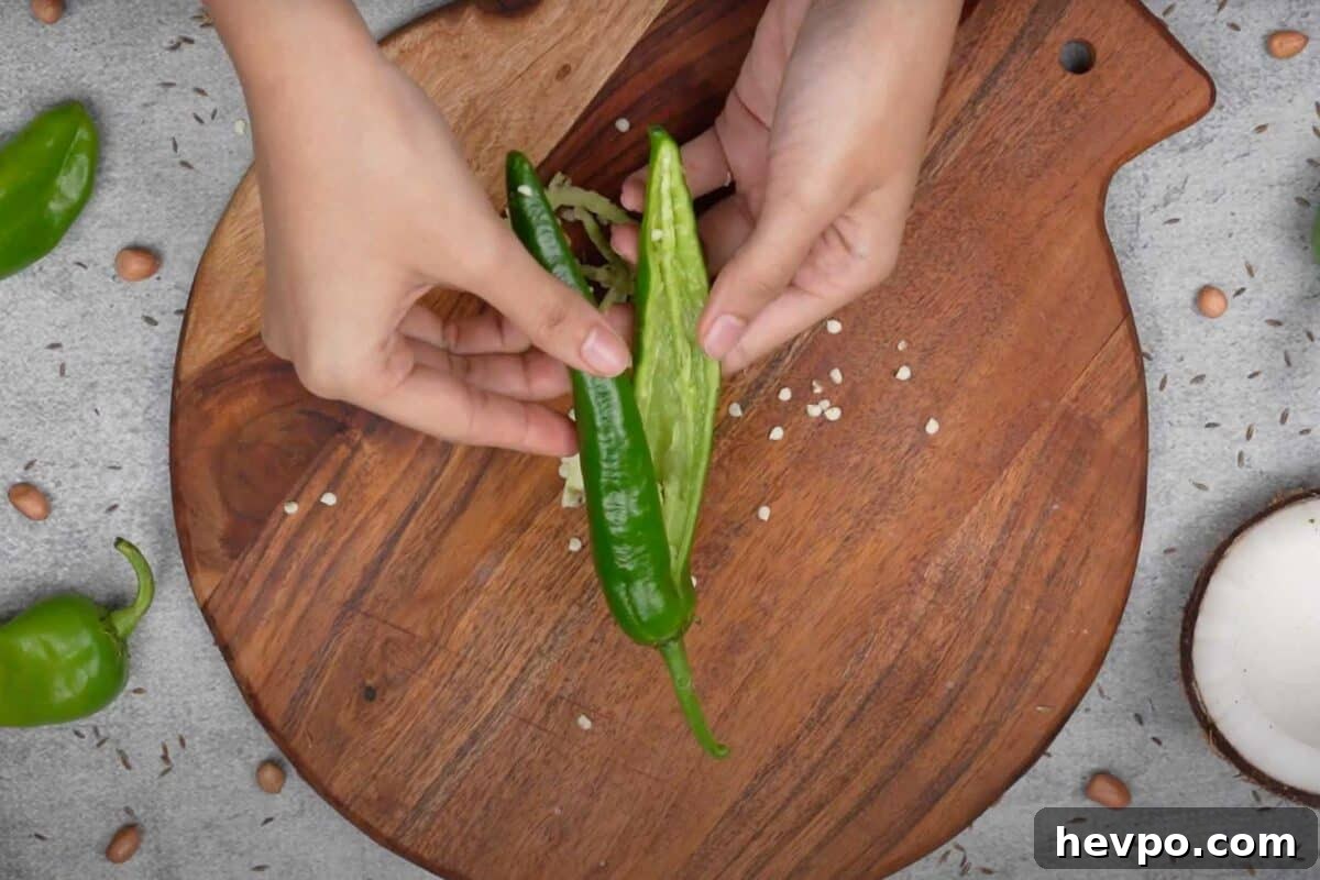 Mirchi Ka Salan (Biryani Salan) Recipe — Spicy Hyderabadi Chili Curry 3 Seeds and pith removed from the chilies.