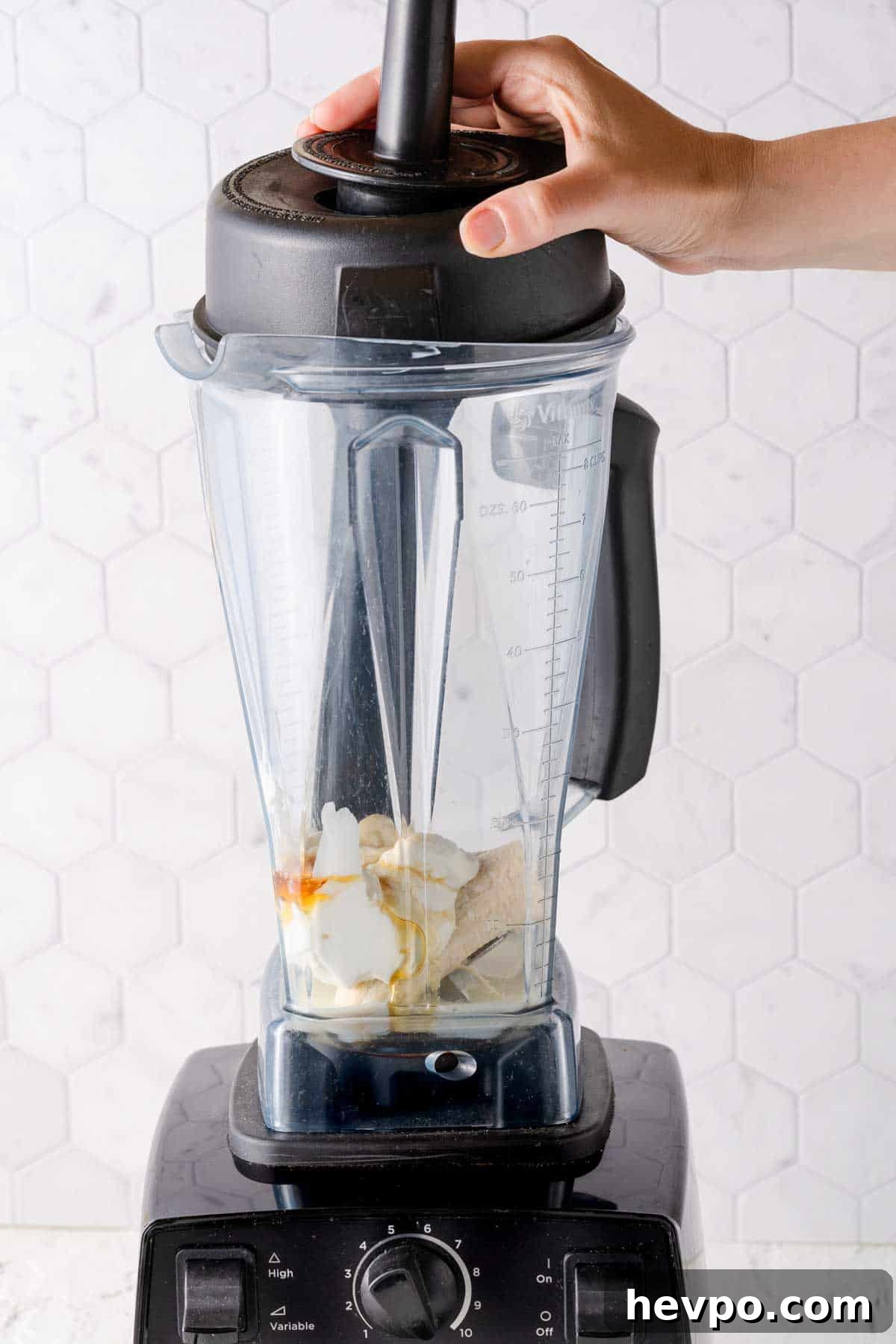 banana, yogurt, honey and milk inside blender