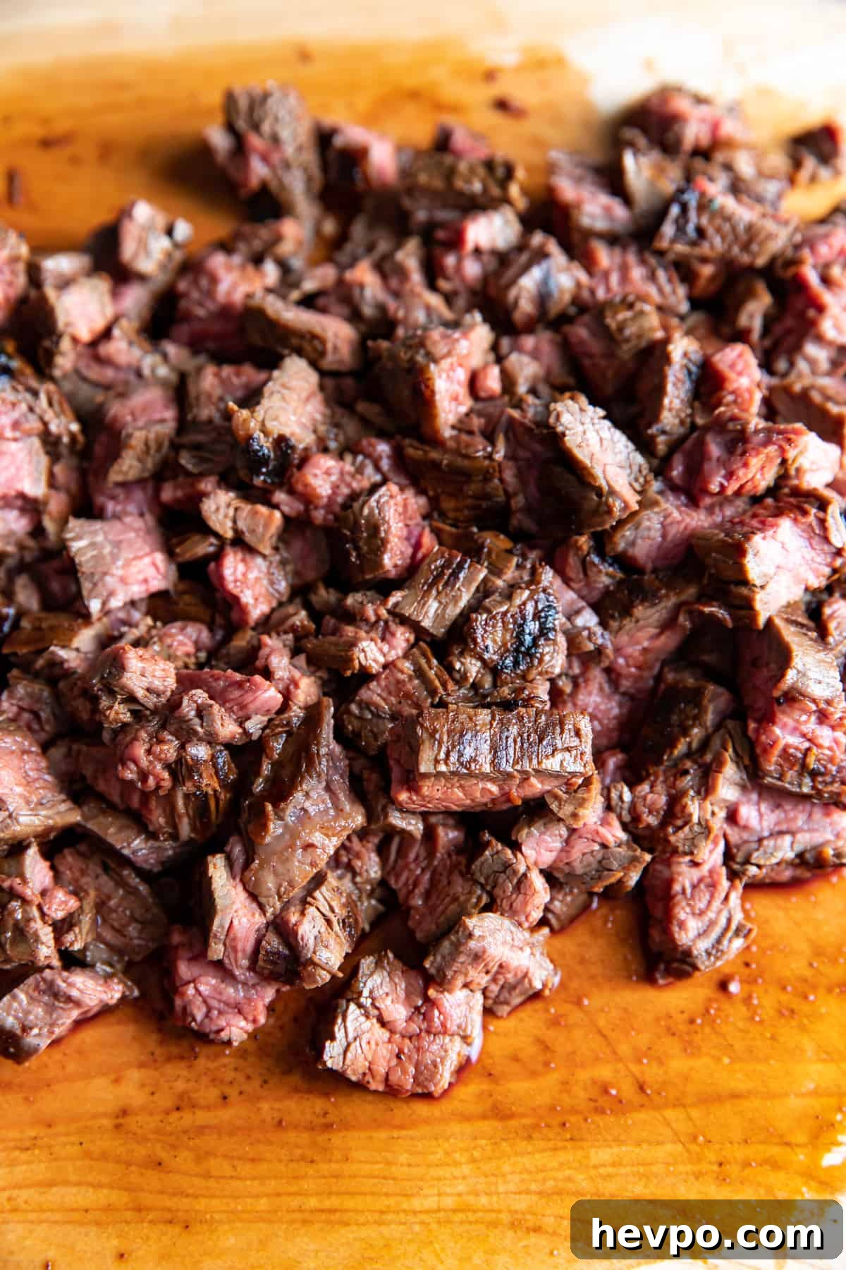 carne asada steak on a cutting board.