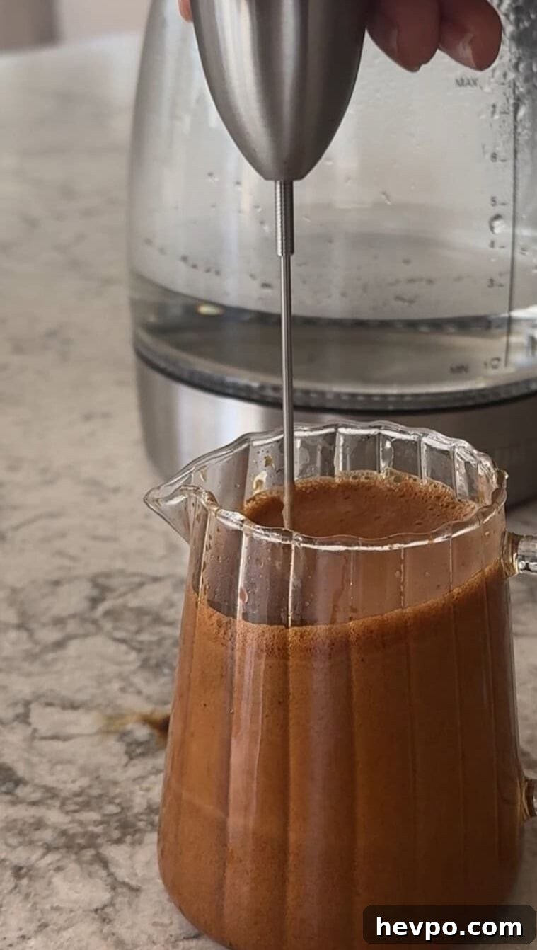 Step one: whisk honey and hot water.