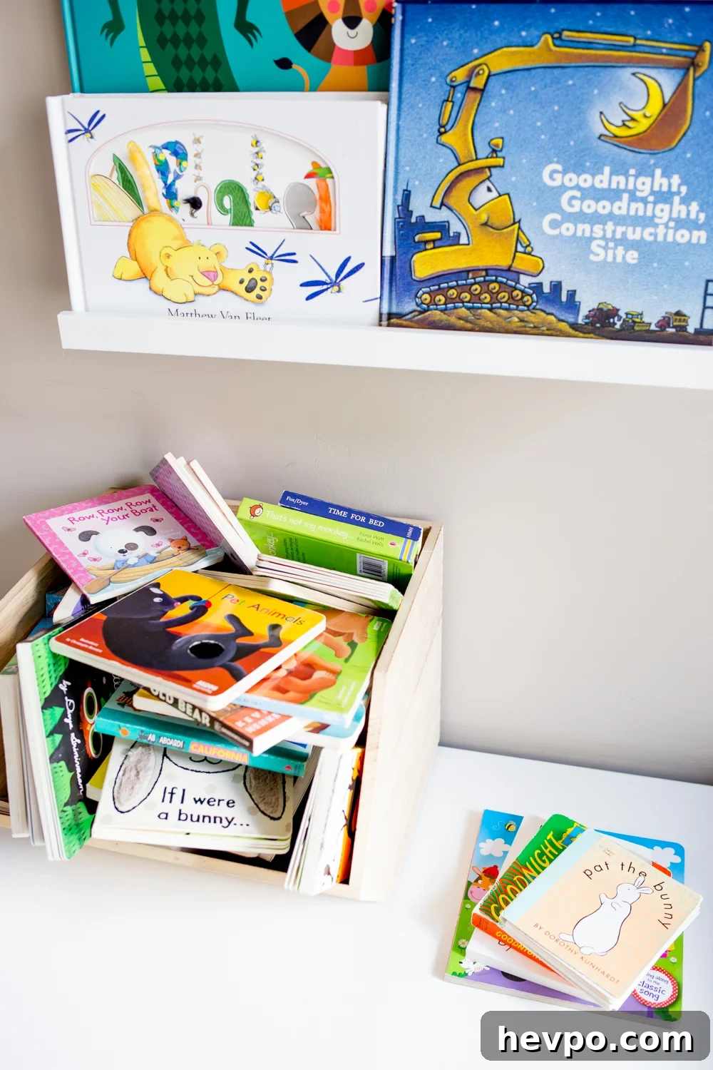 Declutter Kids' Books: Simple Steps to Organize Their Library 2 kids books in a modern bright playroom
